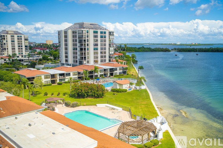 A bathroom with a sink, toilet, and bathtub.