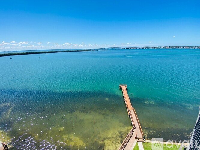 A long pier extends into a body of water.