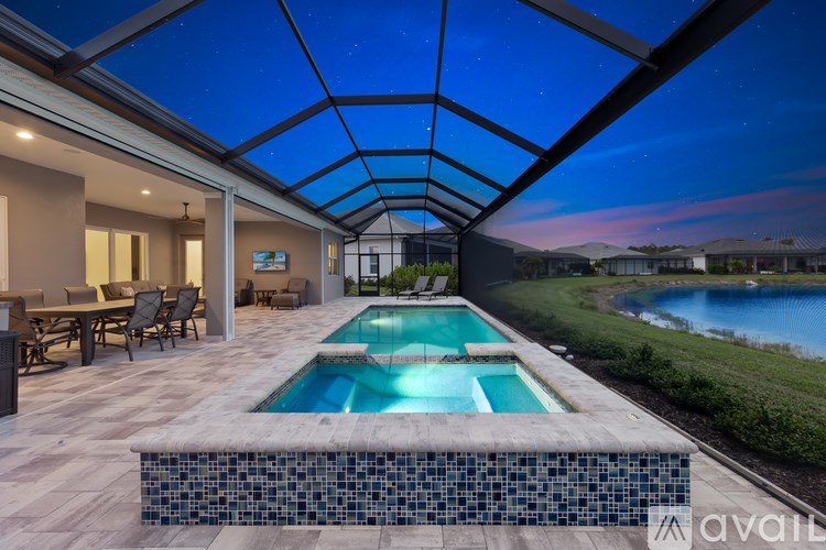 A modern house with a pool and a glass ceiling.