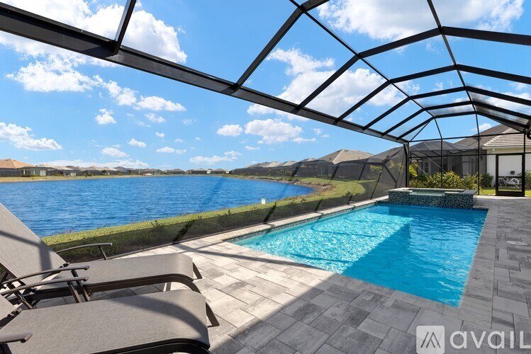 A pool with a chair and a roof.