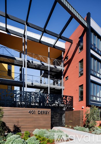 A modern building with a balcony and the number 401 Derby on the side.