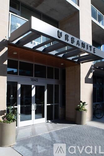 The front of a building with the name URBANITE on it.