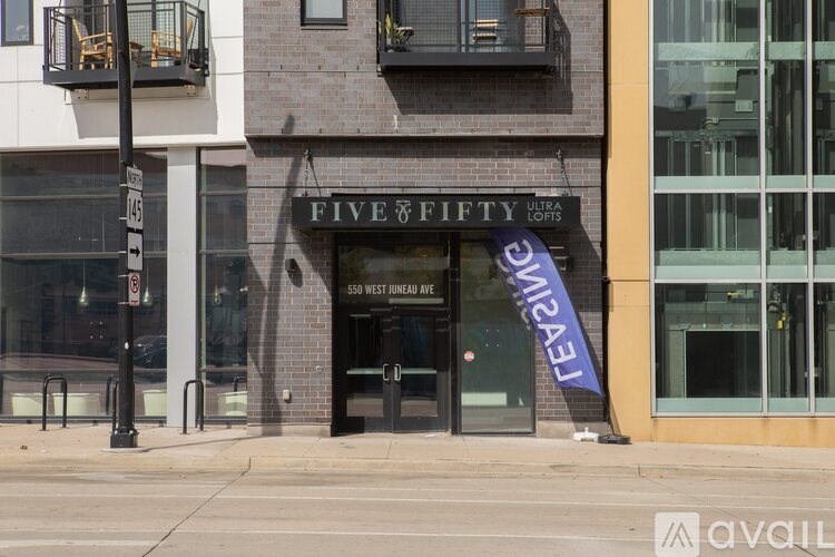 A building with a sign that says "FIVE FIFTY" on it.