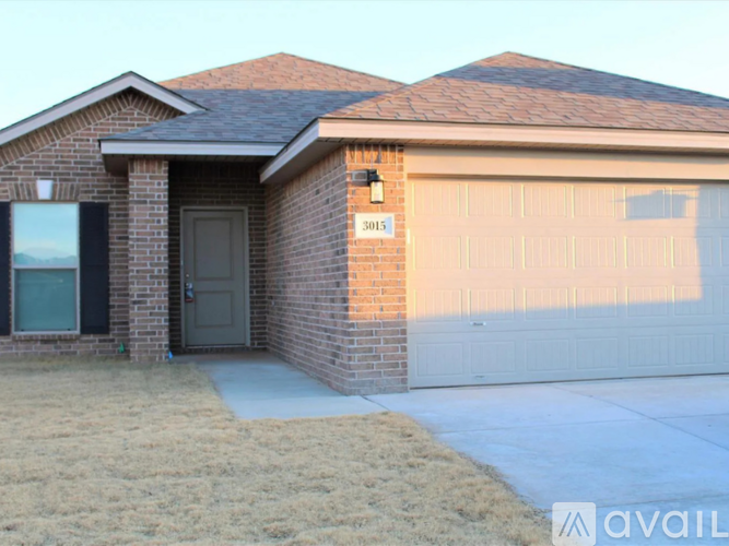 A house with a garage door that is closed.