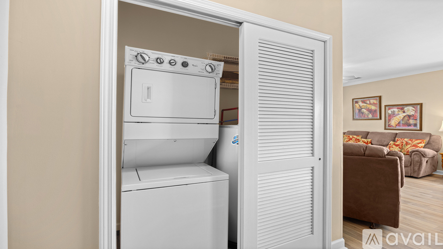 A white oven and dishwasher are installed in a kitchen.