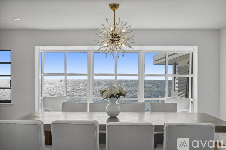 A dining room with a view of the city.