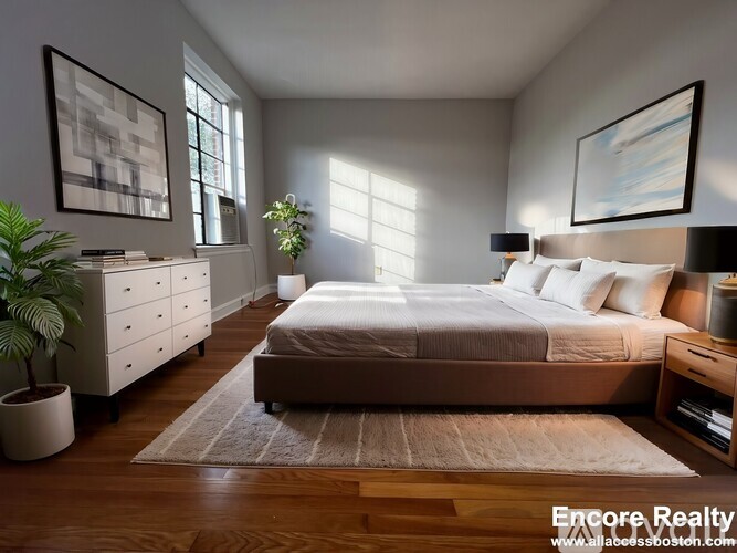 A well-lit bedroom with a large bed, a dresser, and a potted plant.