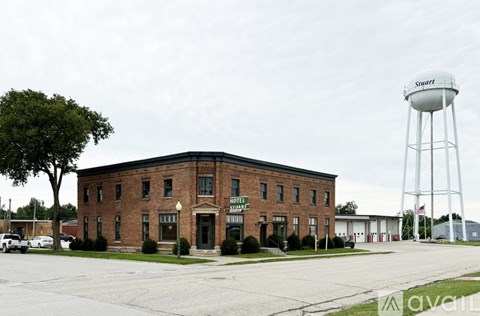 A brick building with a sign that says Smart on it.