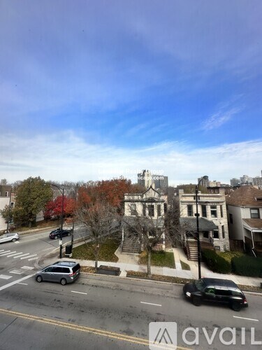 A car is parked on the side of a street.