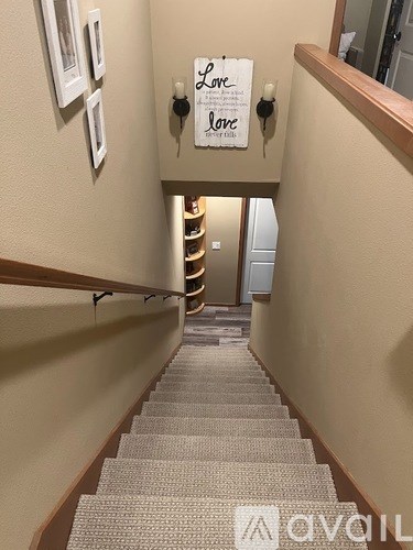 A staircase with a sign that says "Love" on it.