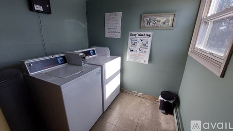 A laundry room with a washing machine and a dryer.