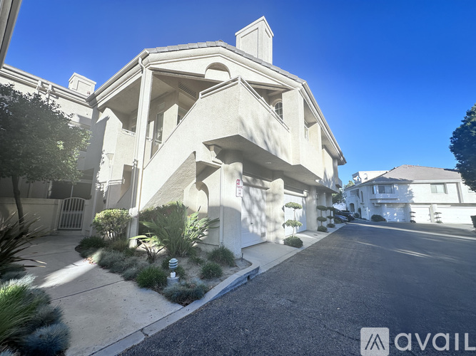 A modern house with a unique architectural design is for sale.