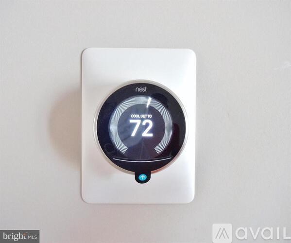 A Nest thermostat is set to 72 degrees Fahrenheit.