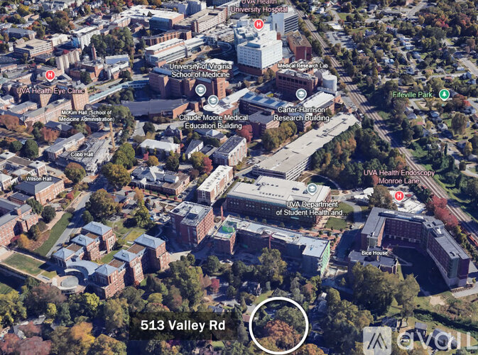 An aerial view of a campus with buildings and roads.