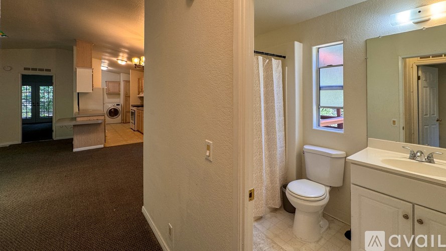 Two washing machines in a laundry room.