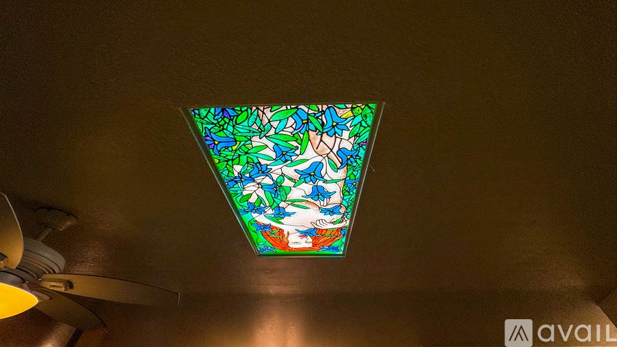 A bathroom with a toilet, sink, and bathtub.