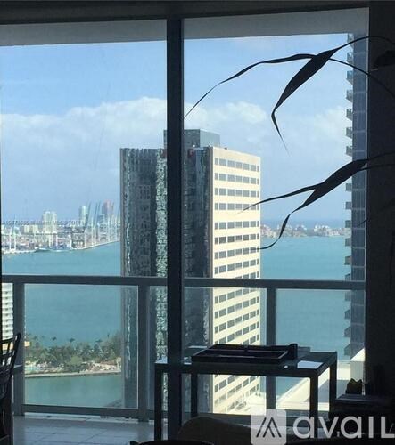 A view of a cityscape from a high-rise building.