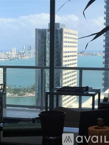 A view of a cityscape from a high-rise building.