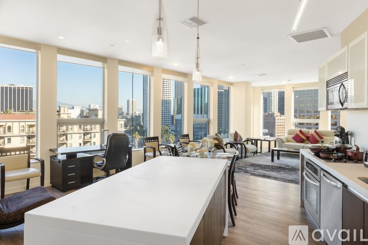 A modern kitchen with a view of the city.