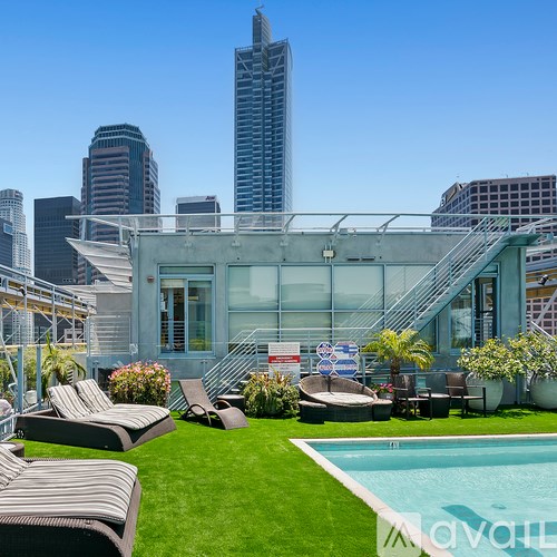 A modern house with a pool in the backyard.