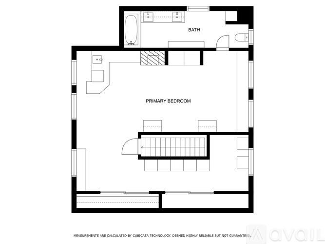 A floor plan of a house with a primary bedroom, a bath, and a kitchen.