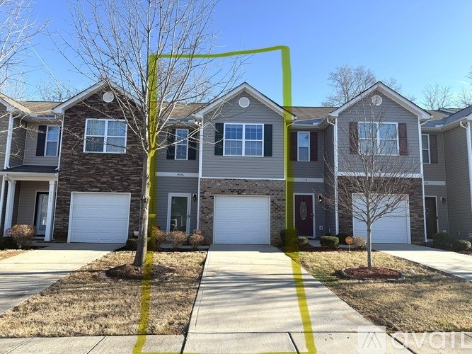 A row of houses with a yellow line in the middle.