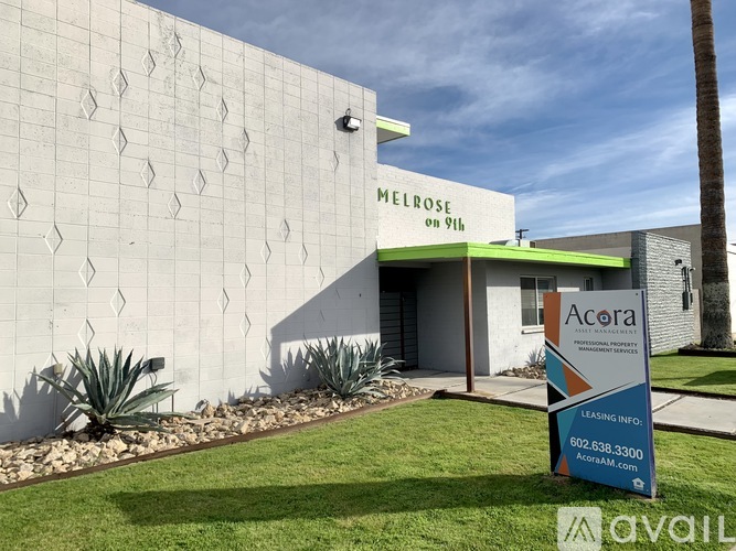 A building with a sign that says Melrose on it.