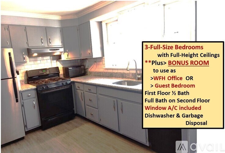 A kitchen with a bonus room above it.