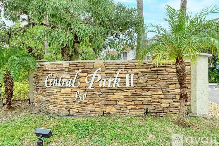 A stone sign that says Central Park II 850.