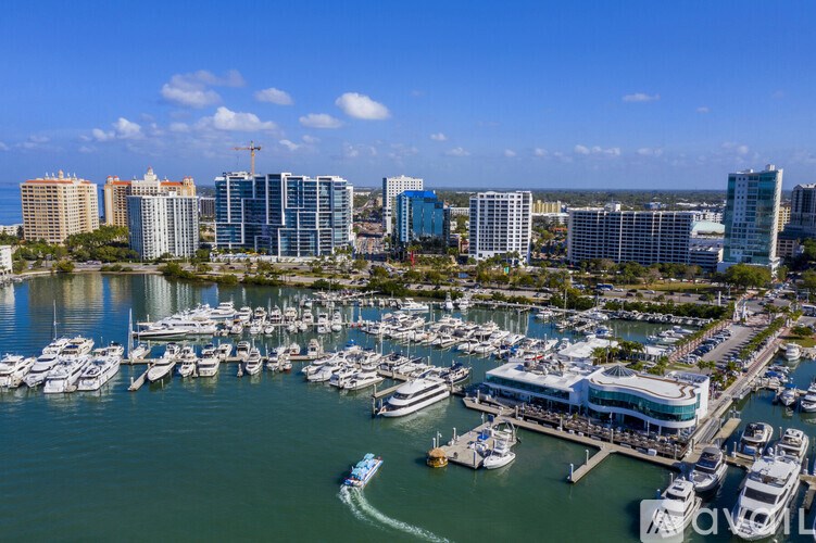 A marina filled with lots of boats on a sunny day.