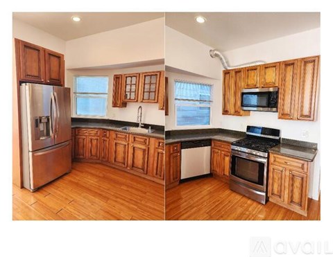 A kitchen with wooden cabinets and stainless steel appliances.