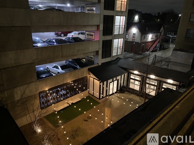 A parking garage with cars parked in it.