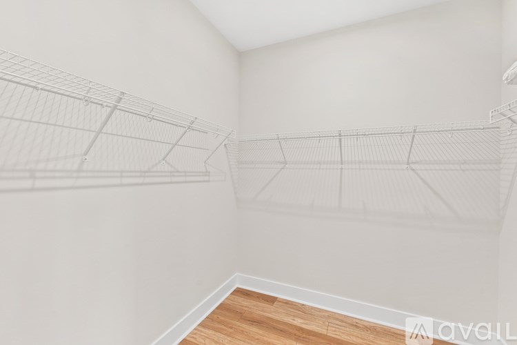 A drawing of a house is projected on a wall.