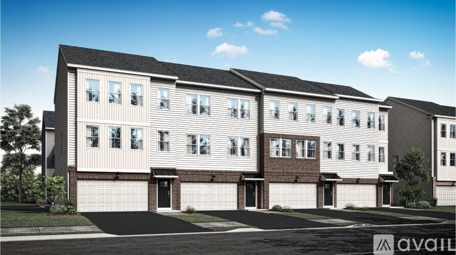 A modern two-story building with a garage is available for purchase.