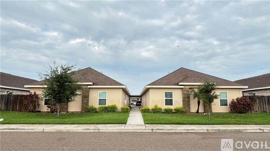 Two houses are available for sale in a residential area.