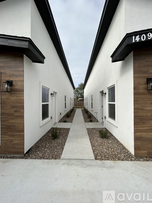 A row of houses numbered 1409.