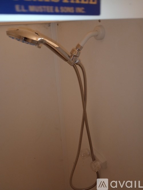 A shower head mounted on a wall.