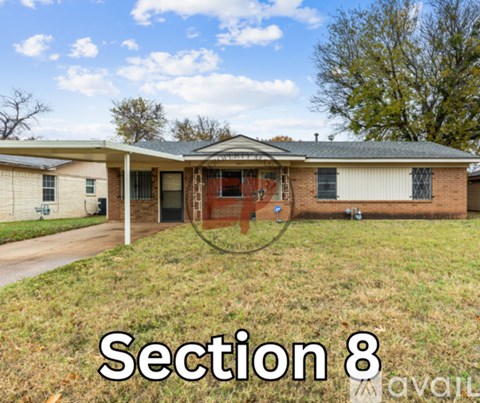 A house with the text "Section 8" in front of it.