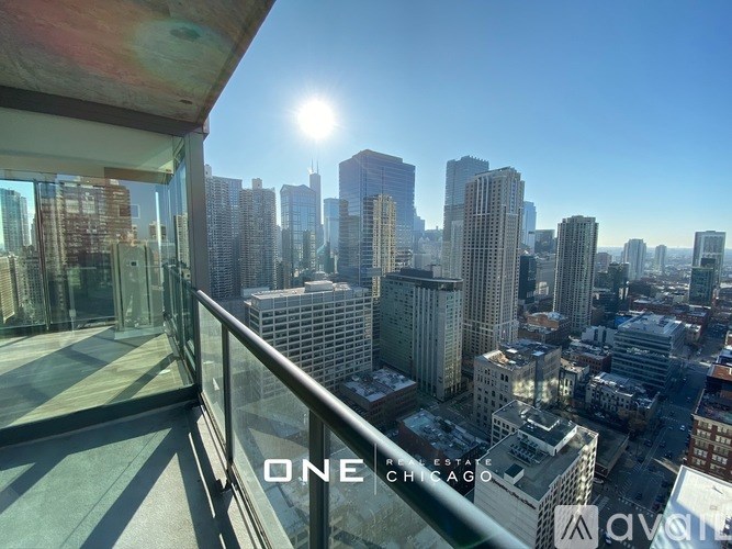A view of a city skyline from a high-rise building.