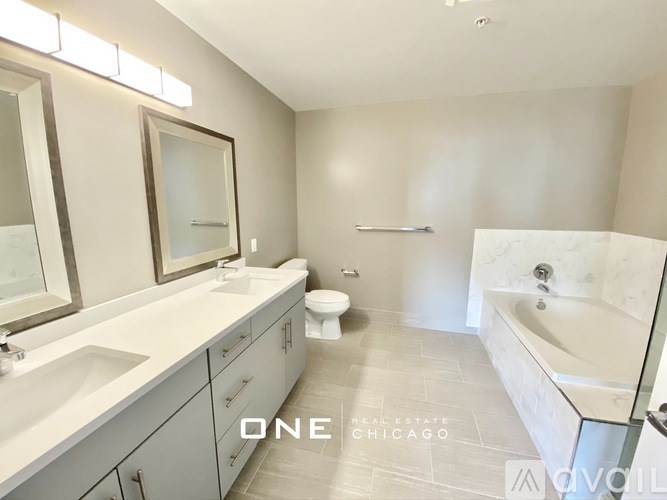 A bathroom with a toilet in the corner.