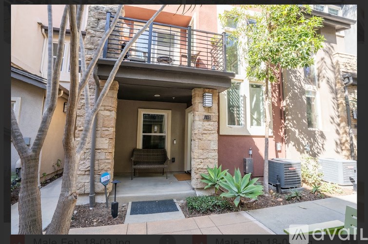 A house number 101 with a tree in front.