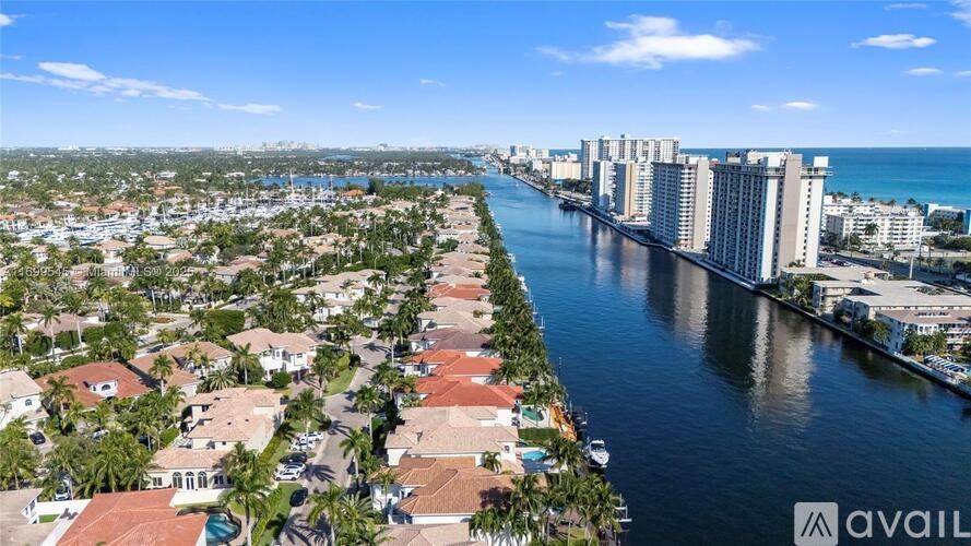 A view of a residential area with a river running through it.