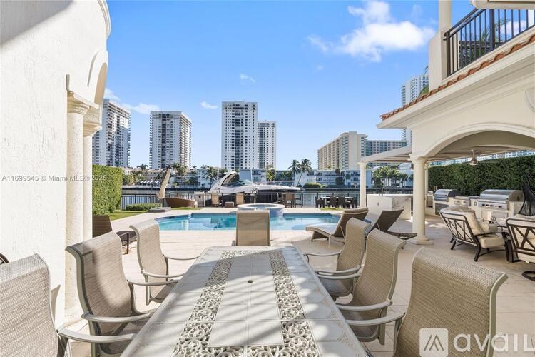 A patio with chairs and a table is available for rent.