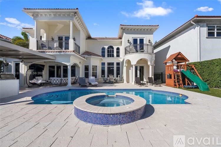 A large house with a pool in the backyard.
