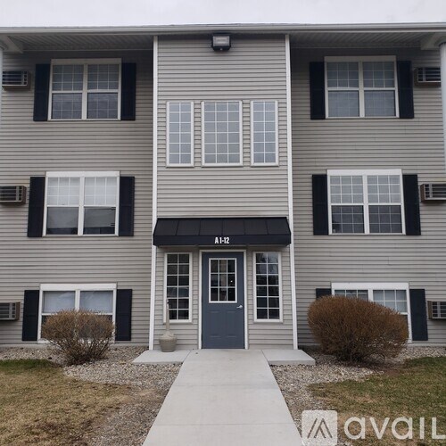 The front of a building with the name AHZ on it.