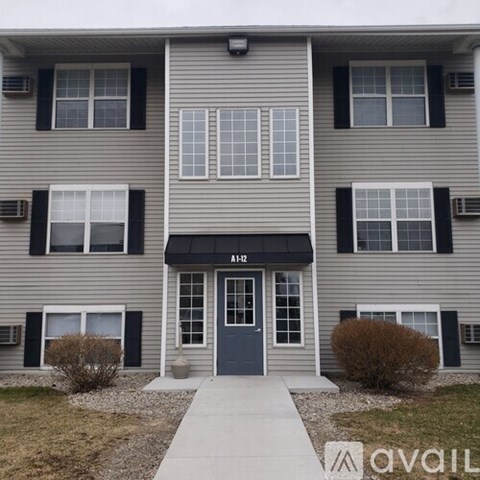 The front of a building with the name AHZ on it.