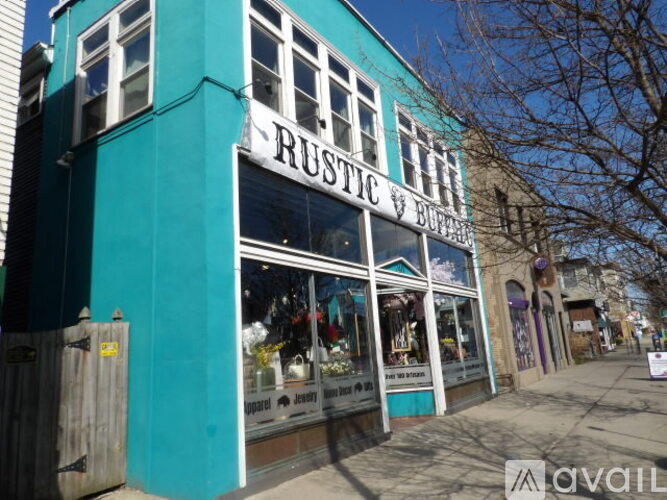 A blue building with a sign that says Rustic.