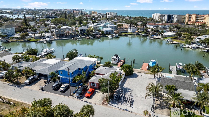 A marina with boats and buildings.