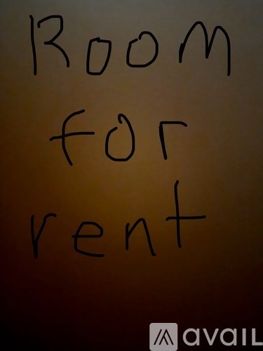A sign that says "Room for rent" is displayed.