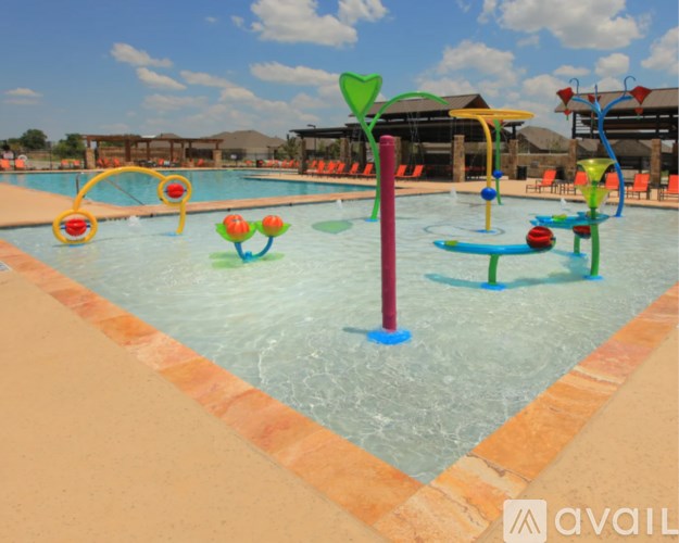 A pool with a blue and red pole in the middle of it.